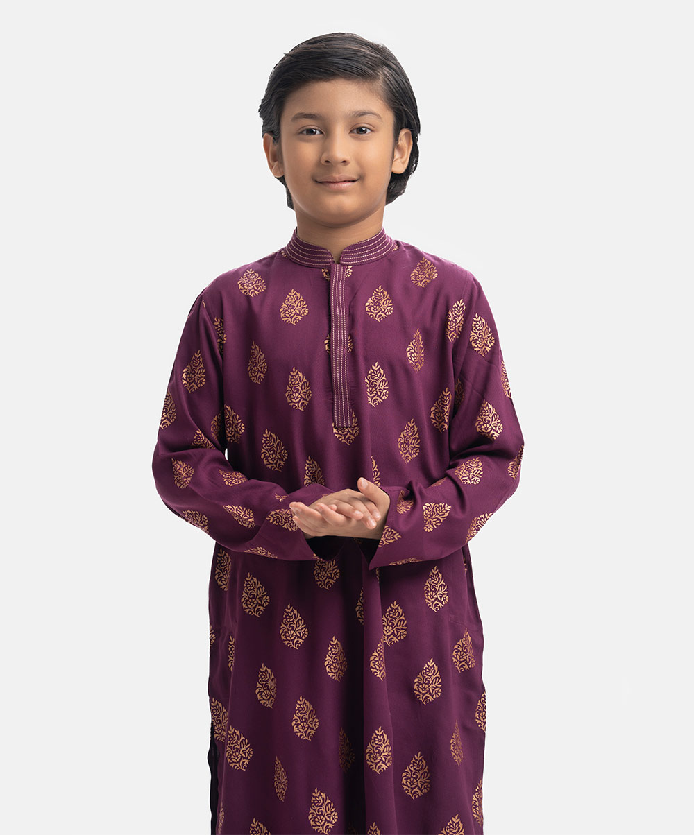Classic viscose panjabi with inseam side pockets and stitches on the collar and hidden button placket. Mauve Viscose Panjabi
