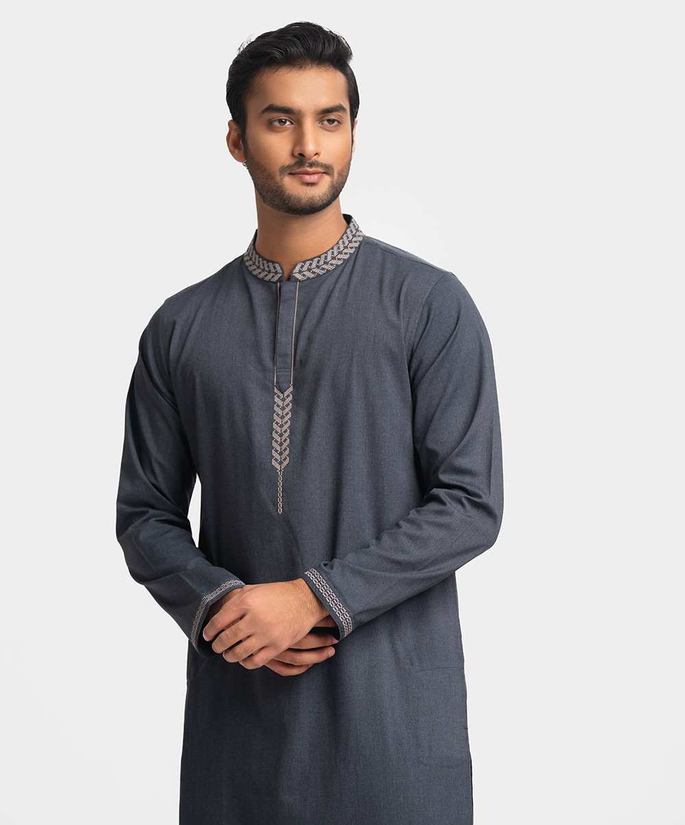 Men's semi fitted panjabi in blended fabric. Embroidery on the collar and placket. Inseam side pockets. Ash Blended Semi Fit Panjabi