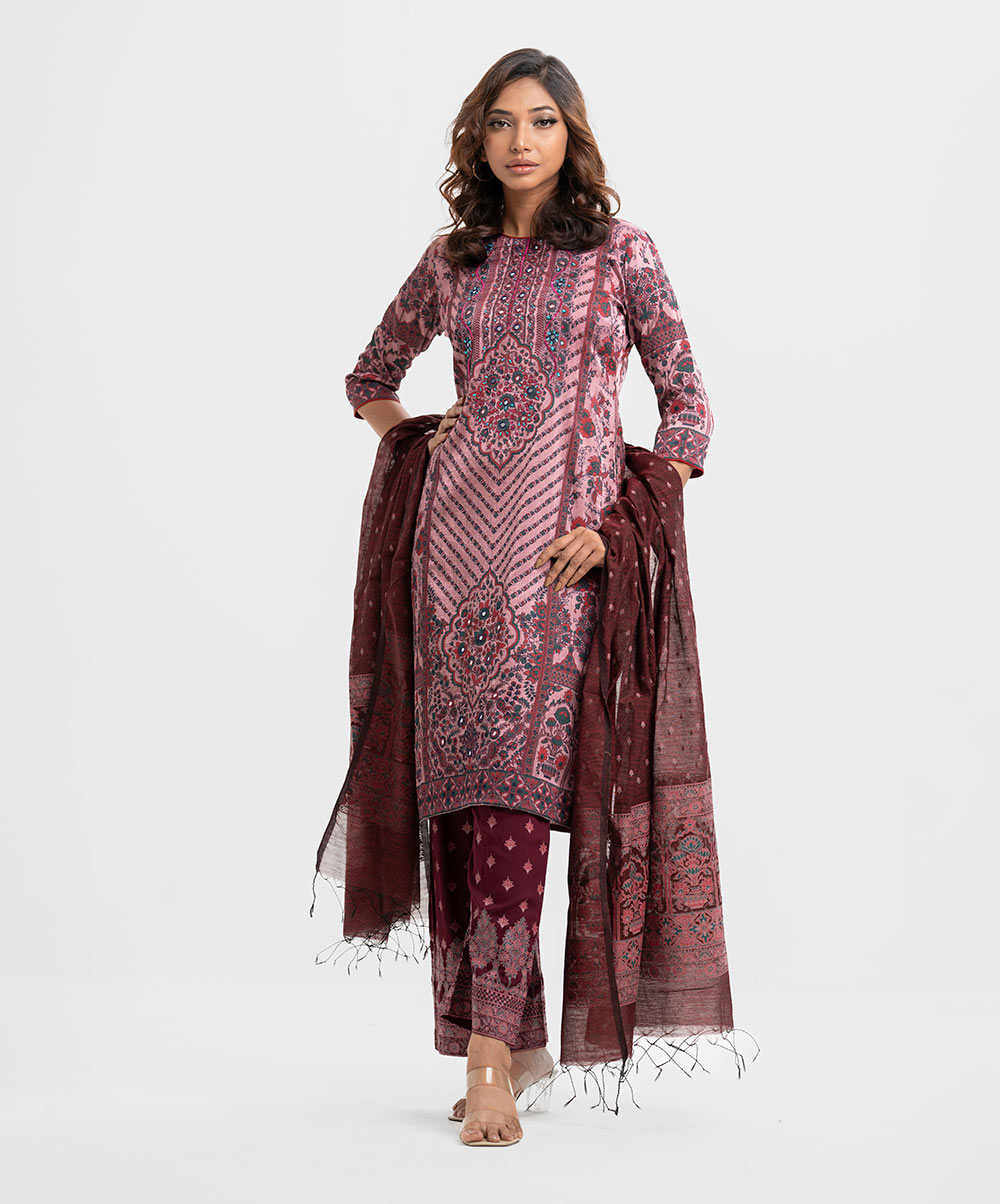 Women's printed straight salwar kameez in georgette fabric. Round neck, three-quarter sleeves and karchupi at the front. Complemented with a viscose palazzo pant and half silk dupatta. Onion Pink Georgette Straight Salwar Kameez