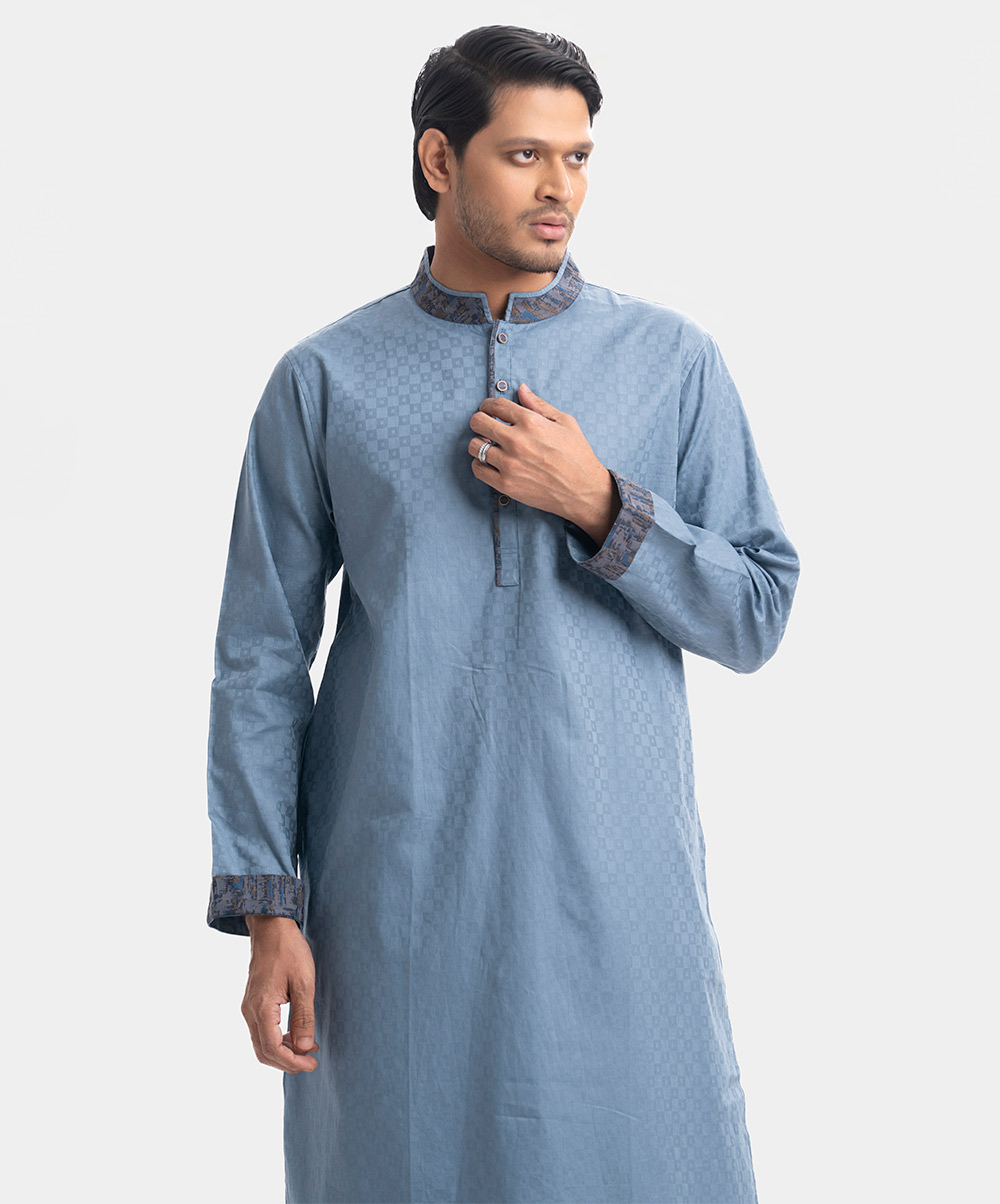 Semi-fitted cotton jacquard panjabi in cotton jacquard fabric. Matching patch on the collar and placket. Inseam side pockets. Blue Jacquard Semi-Fit Panjabi