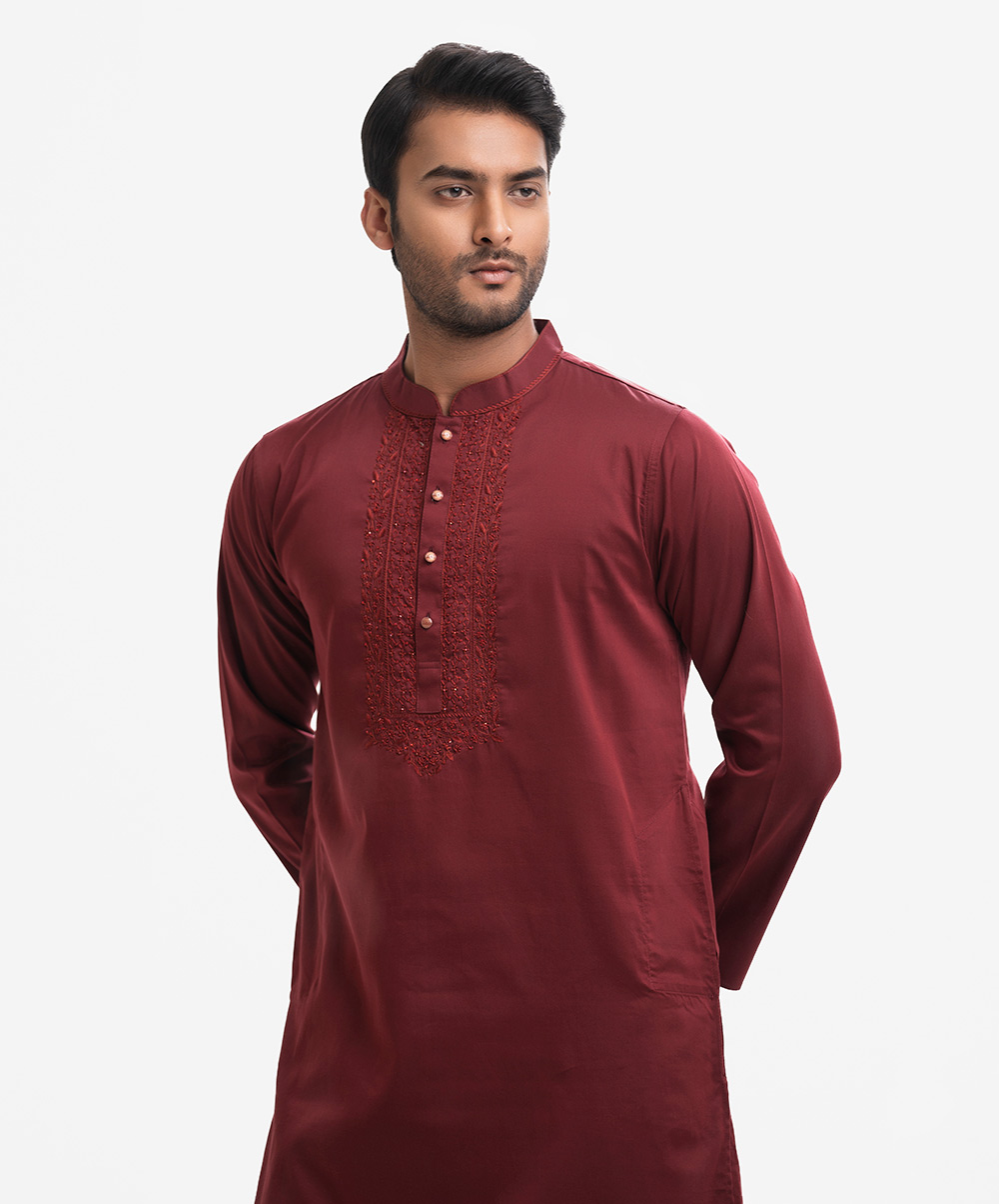 Men's semi-fitted panjabi in cotton fabric. Karchupi at the mandarin collar & placket. Full sleeves and inseam pockets. Maroon Cotton Semi Fit Panjabi