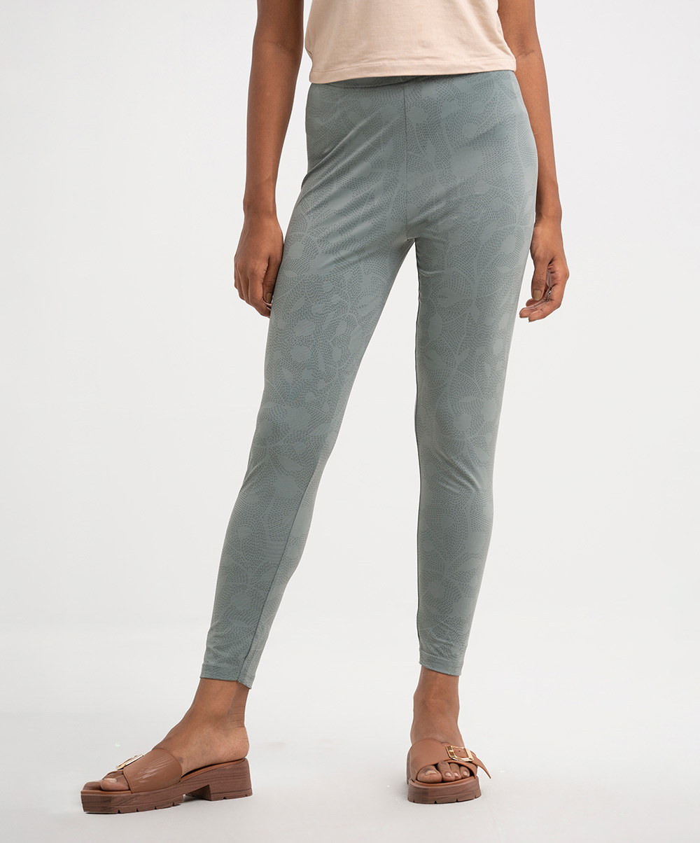 Women's leggings in stretchable cotton knit fabric. Concealed elasticated waistline and all-over printed. Sea Green Cotton Knit Leggings