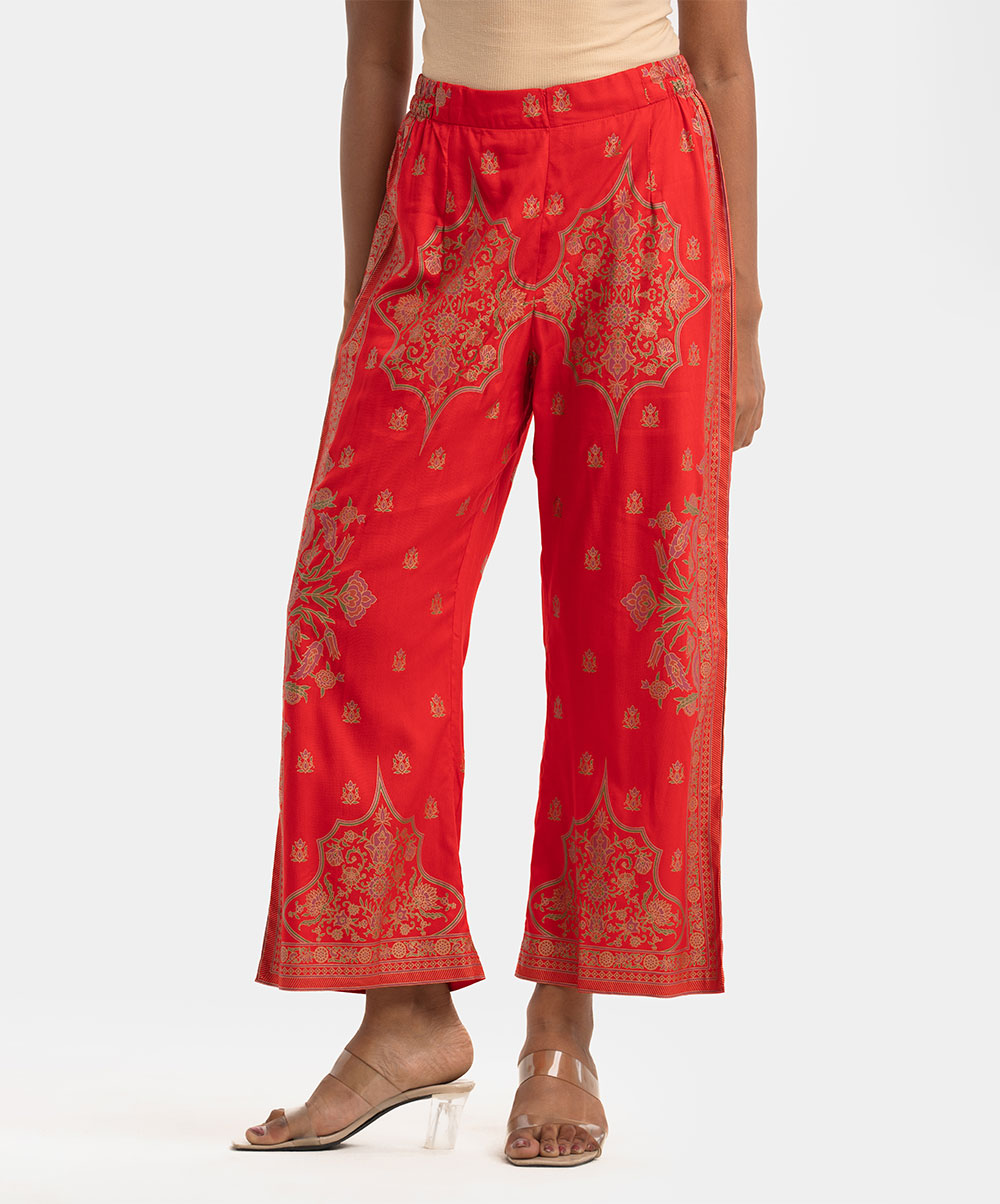 Women's printed regular wear comfortable palazzo in viscose fabric. Concealed elasticated waistline. Red Viscose Printed Palazzo