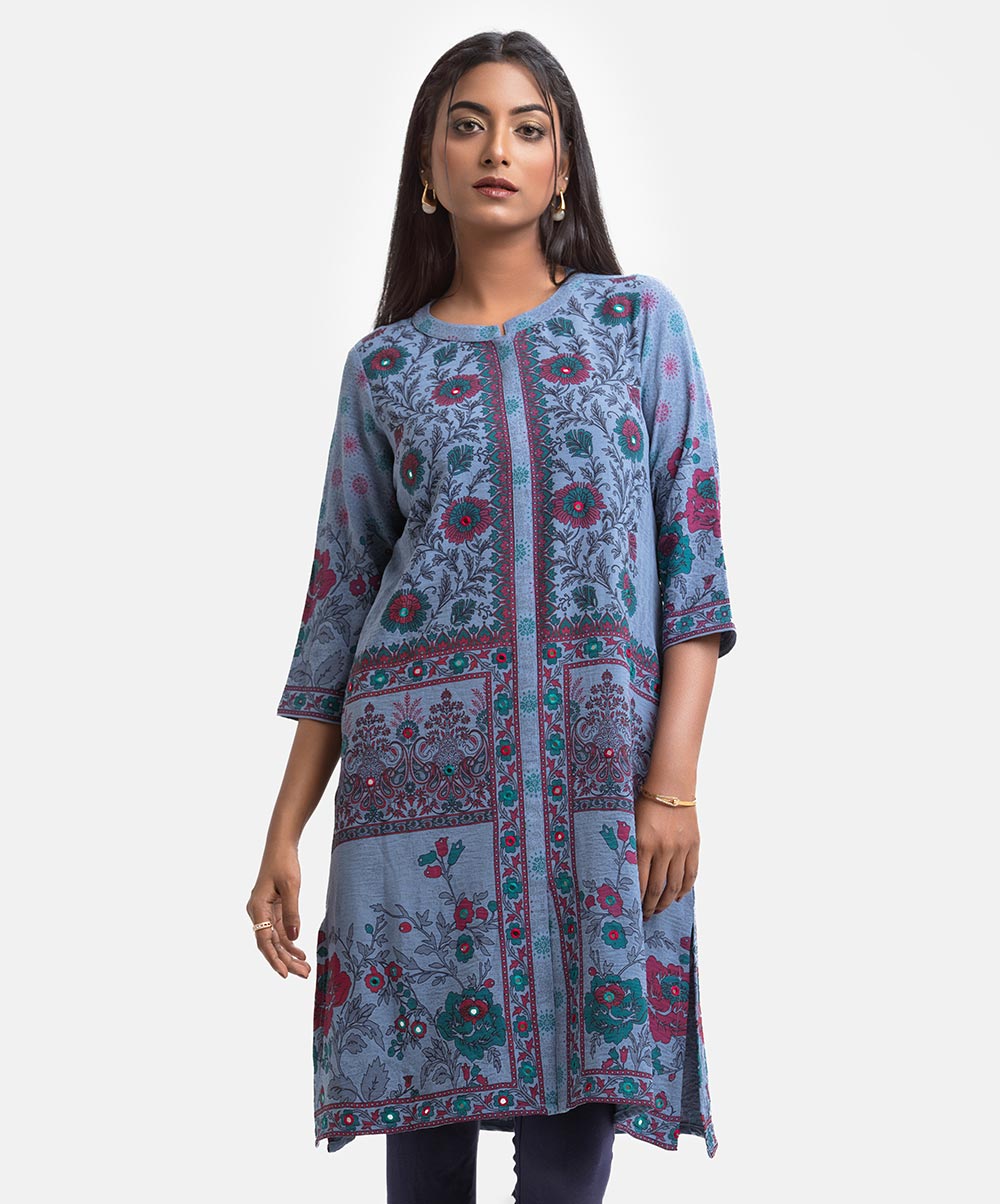 Woman's floral printed A-line tunic in stretchable georgette fabric. Stand collar, three-quarter sleeves. Karchupi at front and inseam pockets. Ash Stretchable Georgette A-line Tunic