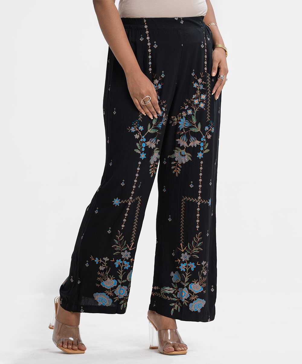 Women's printed regular wear comfortable palazzo in viscose fabric. Concealed elasticated waistline. Black Viscose Printed Palazzo