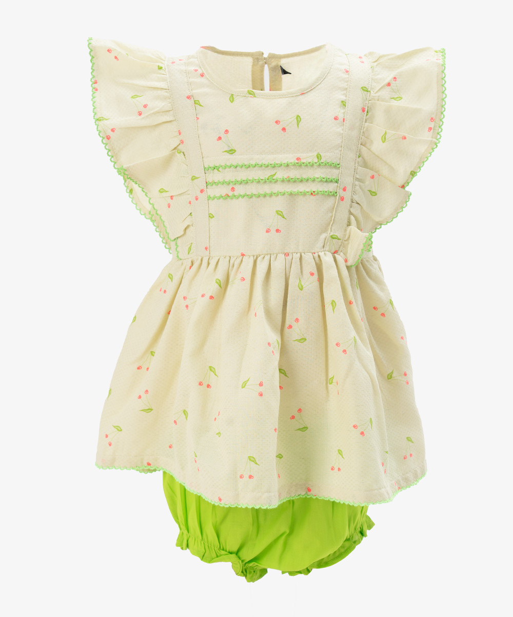 Butterfly sleeves newborn baby girls frock & pant set in cotton fabric. All-over printed with lace work at the chest and sleeves hem. Lemon Cotton Newborns Frock