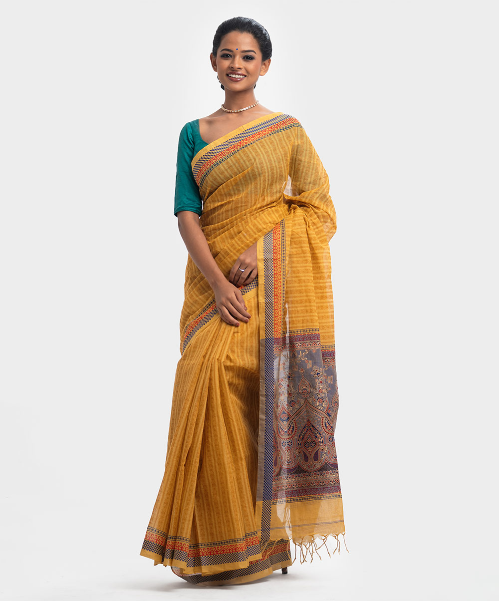 Women's printed Saree in cotton fabric. Fringe trim at the border of Aanchal. Mustard Yellow Cotton Printed Saree