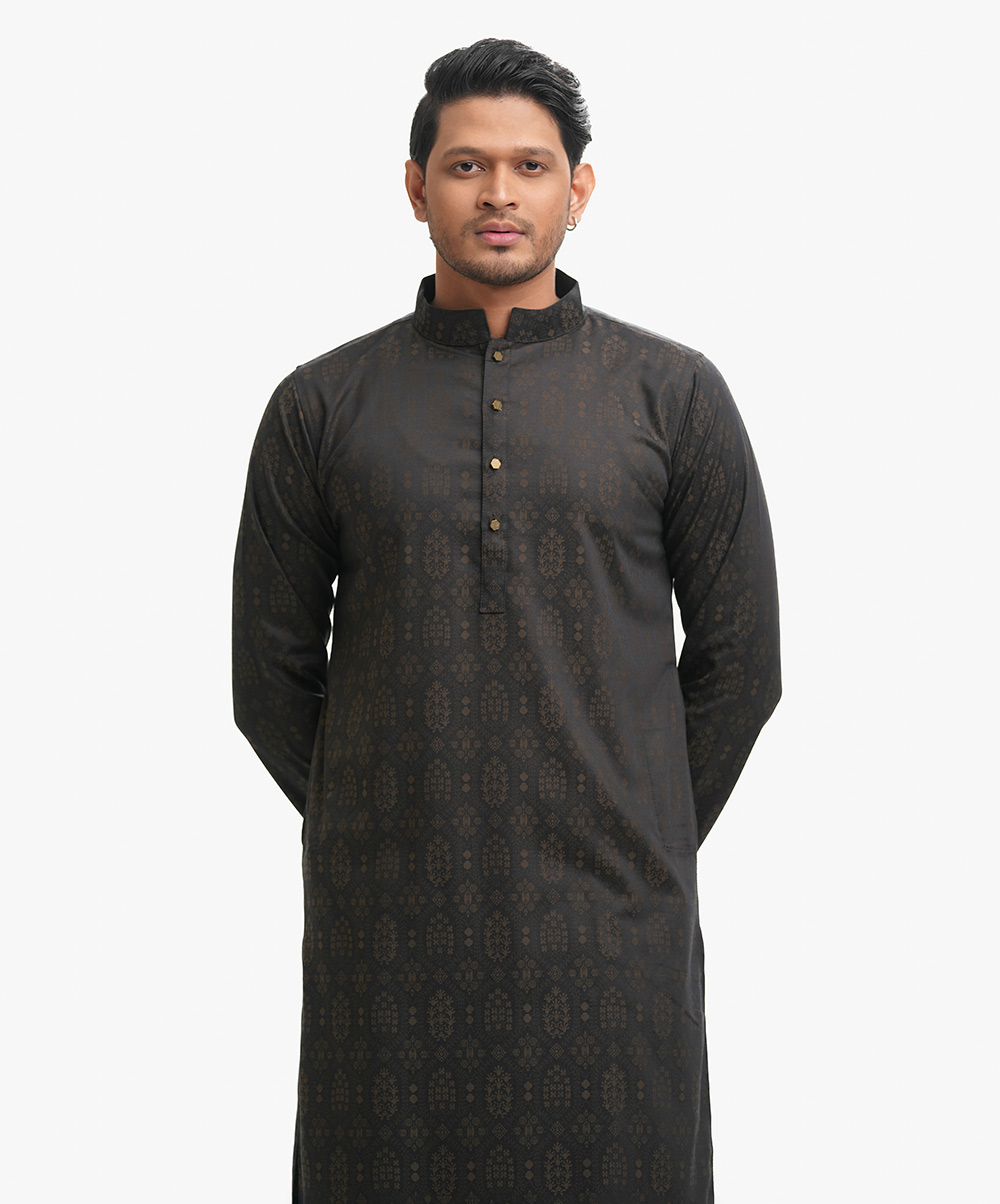Men's semi-fitted panjabi in cotton Jacquard fabric. Mandarin collar & metal buttons placket. Full sleeves and inseam pockets. Black Jacquard Semi Fitted Panjabi