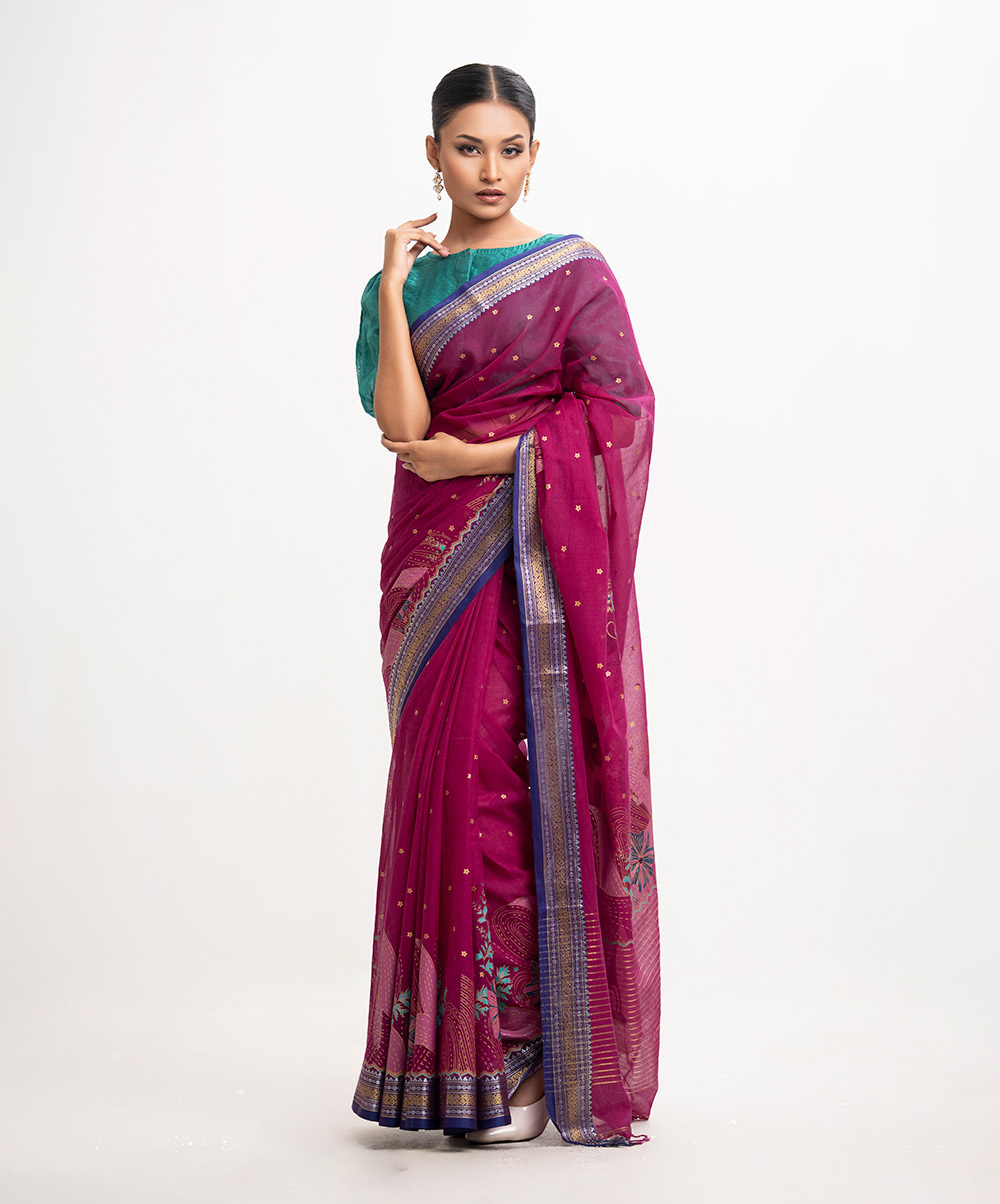 All-over weaving details saree in cotton fabric. Fringe trim at the Aanchal. Burgundy Cotton Saree