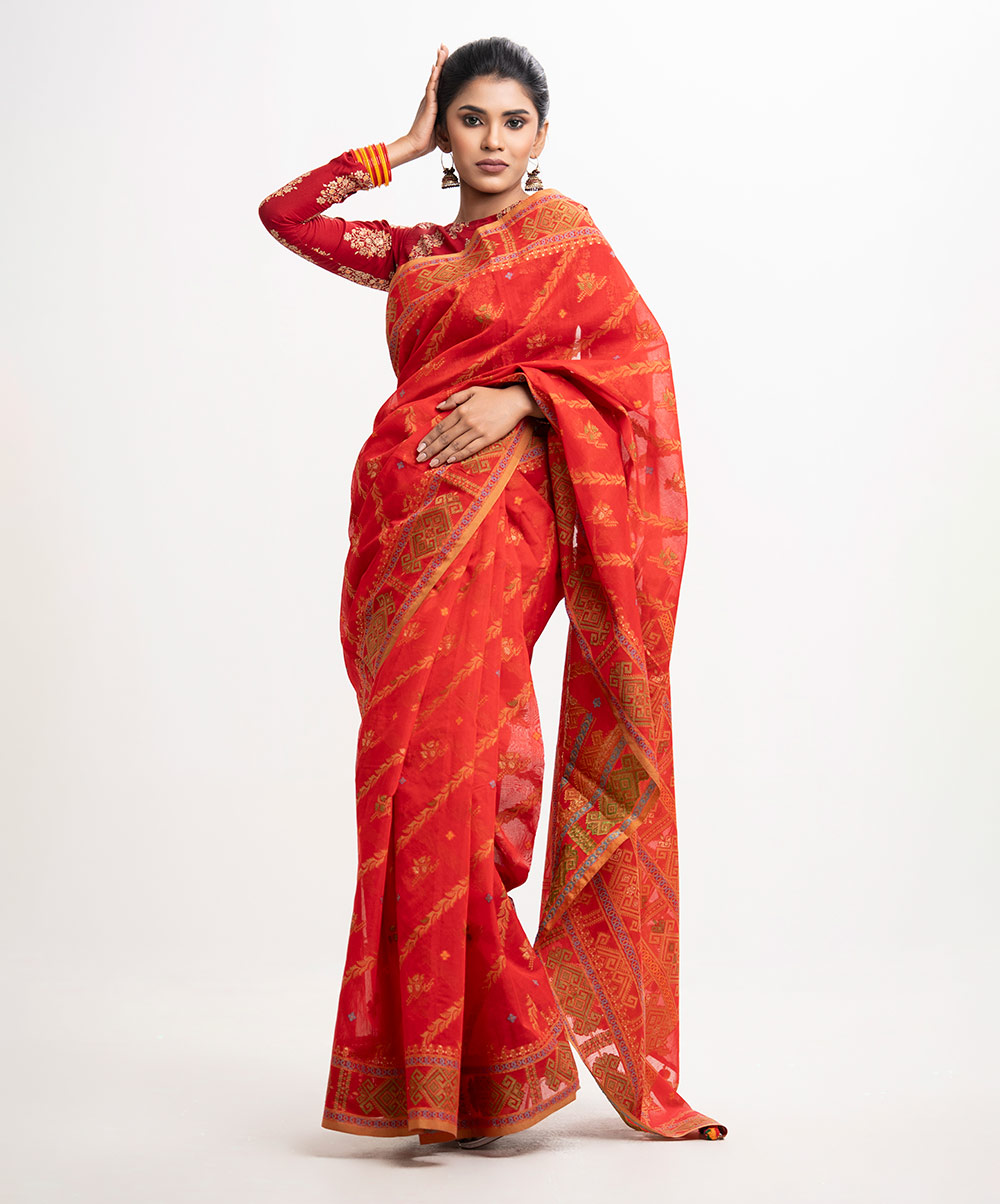 All-over jamdani pattern weaving details saree in half-silk fabric. Tassels at the Aanchal. Red Half-silk Saree