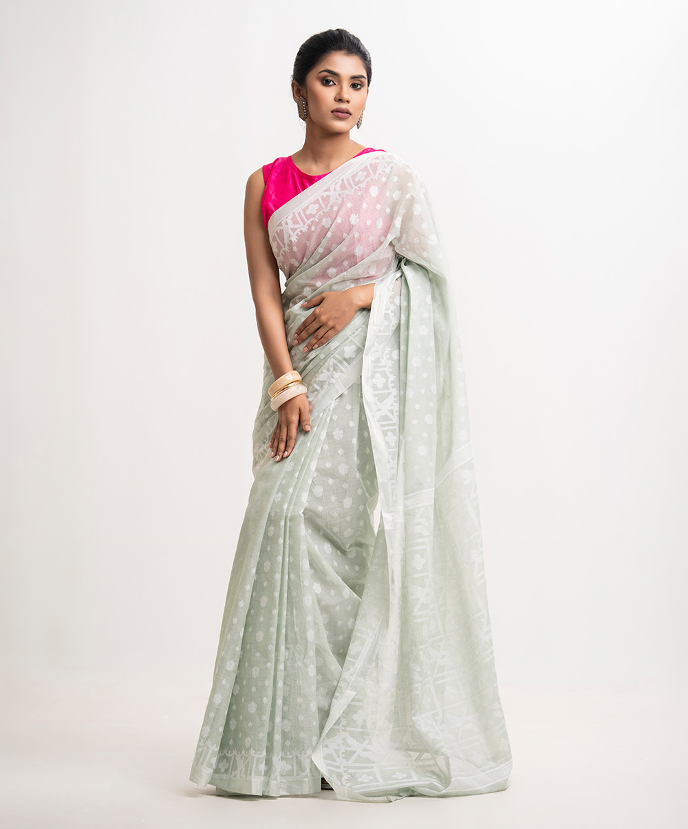 All-over Jamdani pattern weaving details saree in cotton fabric. Light Green Cotton Saree