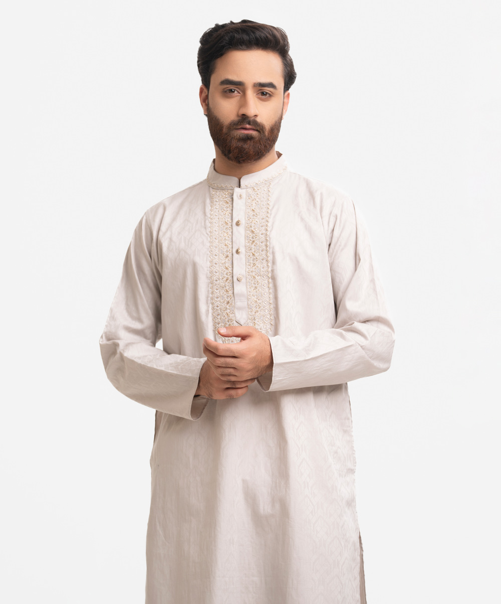 Men's fitted panjabi in jacquard fabric. Long sleeves, inseam side pockets. Karchupi on the collar and placket. White Jacquard Fitted Panjabi