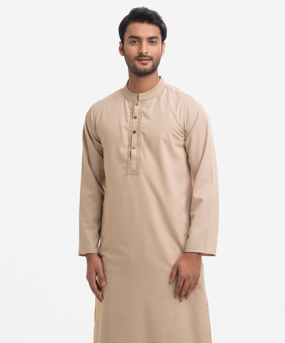 Men's fitted panjabi in viscose fabric. Long sleeves, inseam side pockets. Embroidery on the collar and placket. Beige Viscose Fitted Panjabi