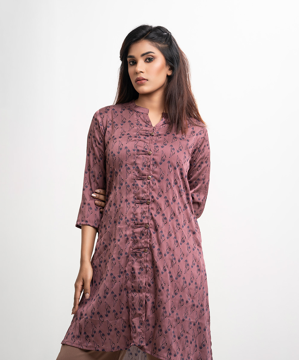 V-neck, A-line tunic in georgette fabric with a sheen. Three-quarter sleeves, loop button details. Mauve Georgette A-line Tunic